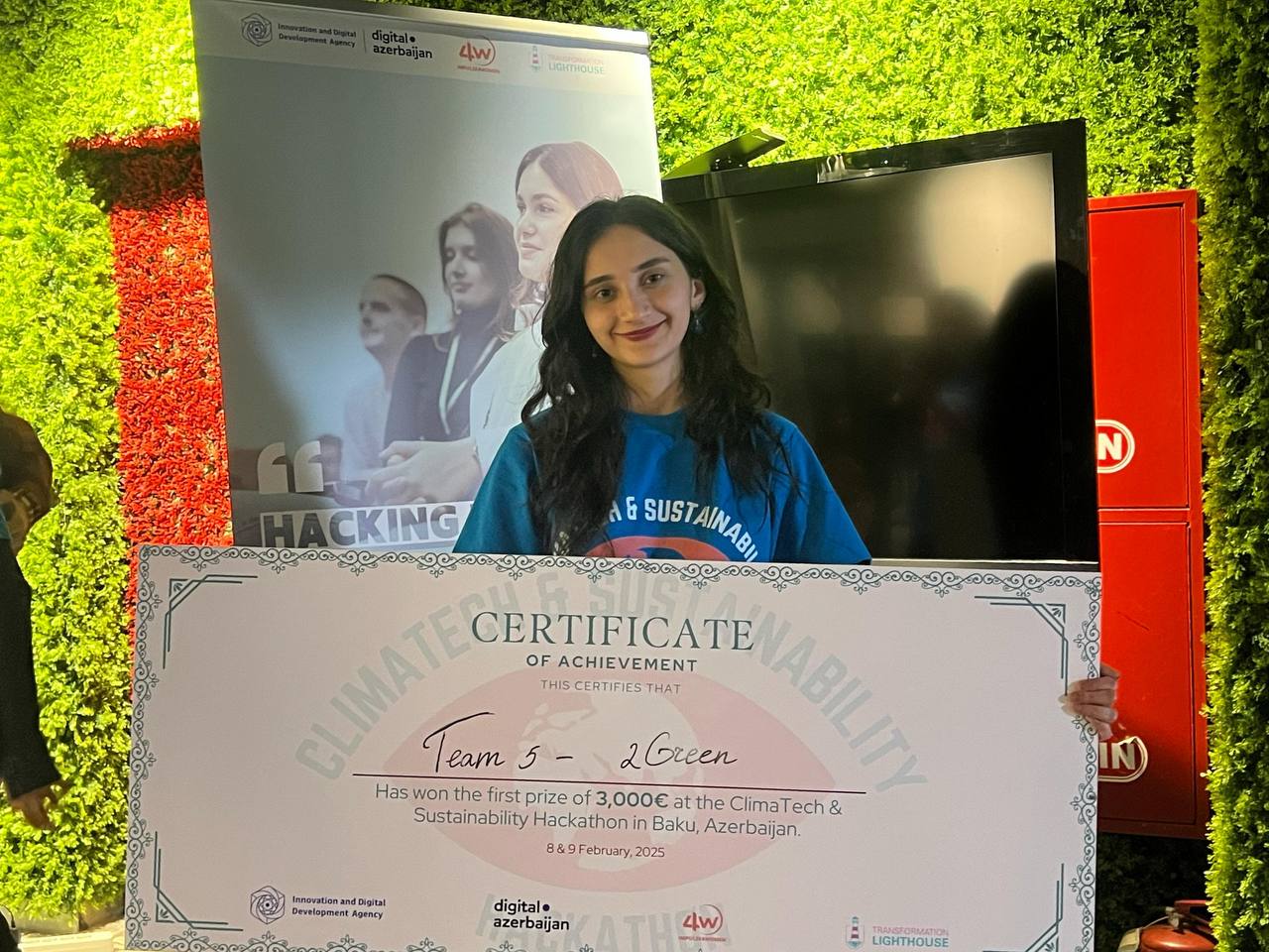 Team member with certificate